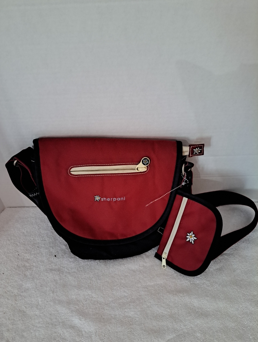 Sherpani Red Crossbody Messenger Bag with Coin Pouch and Black Trim